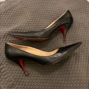 Christian Louboutin black pumps